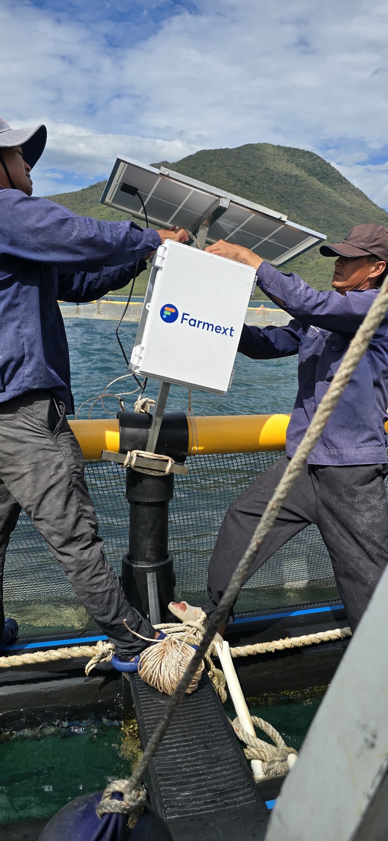 Farmext technicians deploying Envisor Marine